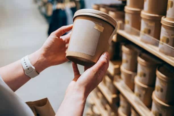 paper soup bowls with lids in supermarket