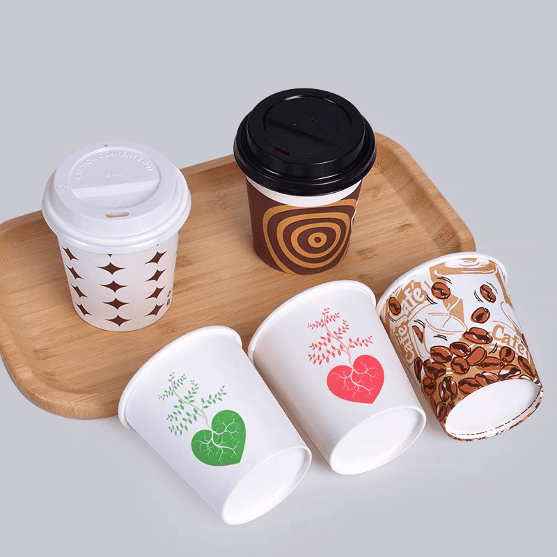 paper cups with white and black lids