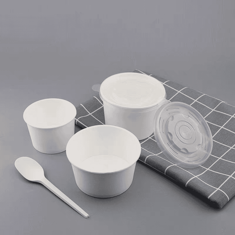 white paper soup cup with lid aside